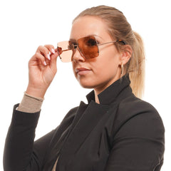 نظارات شمسية معدنية باللون الذهبي الوردي