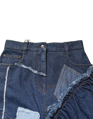 تنورة ميدي من الدنيم المرقّع باللون الأزرق