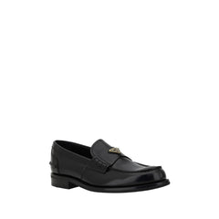 Triangular plaque loafers
