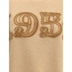 سويت شيرت من الصوف باللون البيج